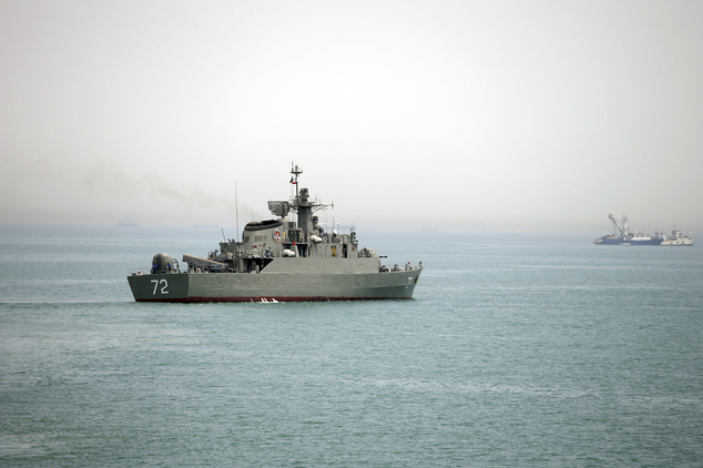 FILE - In this Tuesday, April 7, 2015, file photo released by the semi-official Fars News Agency, Iranian warship Alborz, foreground, prepares before leaving...