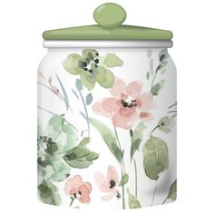 a jar with flowers painted on it