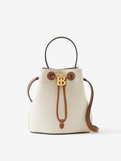 Mini TB Bucket Bag in Natural/malt Brown - Women | Burberry® Official Burberry, Handbags, Leather, London, Burberry London, London Design, Global Brands, Bucket Bag, For Women