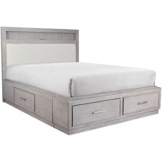 a bed with two drawers underneath it and a white bedspread on the bottom