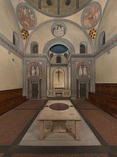 the interior of an old church with paintings on the walls