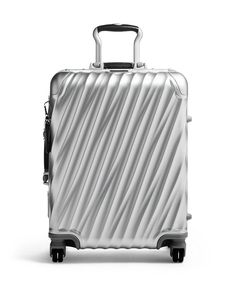 Striking from every angle, this carry-on boasts a modern silhouette with iconic, fluid-looking contours. The durable aluminum construction is designed to meet most domestic carriers' carry-on guidelines. Carry On Size, Spinning Wheels, Interior Vintage, Frequent Traveler, Bag Suitcase, Voyage Europe, Carry On Suitcase, Combination Locks, Jet Setter