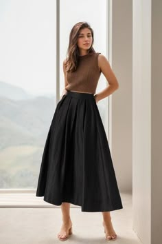 "you can wear it as a casual skirt for travelling, having a picnic with your friends, dating and shopping, Perfect for lazy days that you want to sustain a chic and stylish appearance. DETAIL * 100% linen  * Linen skirt, black Linen skirt * Organic Linen skirt * Right Side zip closure * Two side pockets * pleated waist detail * Back elastic waist, plus size skirt * Midi Linen skirt * Perfect for summer, spring, autumn MODEL SIZE Bust 85 cm(33.4\") Waist 67 cm(26.7\") Height 168cm (5' 6\") She wears size XS Choose CUSTOM Order if you * Can't find your size in our size Chart * Your Height is not Between 5'1\" - 5\"9\" * Your weight is over 80kg SIZE GUIDE Size vary between Brand and Country Please get your body measurement with our Size Guide And Find your size in our Size Chart SIZE CHART h Office Skirt Women, Black A Line Skirt Outfit Casual, Summer A-line Maxi Skirt With Pockets, A Line Black Skirt Outfit, Spring Long Pleated Culottes, Casual A-line Maxi Skirt With Pleats, Summer Pleated Wide Leg Culottes, Summer Midi-length Pleated Skirt With Pockets, Summer Wide Leg Pleated Culottes