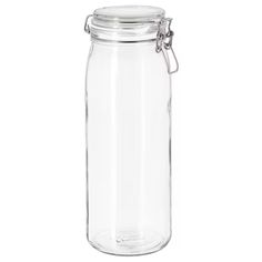 a clear glass jar with a metal clip