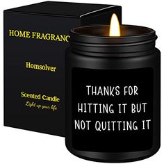 a candle that is sitting in front of a box with the words, thanks for hitting it but not quiting it