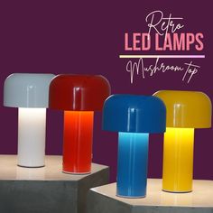 three different colored lamps sitting on top of each other in front of a purple background