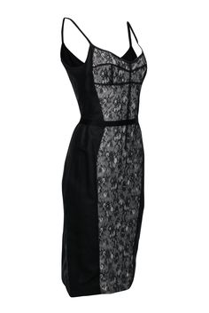 Look sultry and feel luxurious with this Dolce & Gabbana fitted dress. This dress flatters your shape with princess seam lines outlining a classic lace middle. Pair this with sky-high pumps and a mini bag for an elevated LBD look! Size 10 (IT 46) Shell: 50% Polyamide, 35% Cotton, 15% Silk Lining: 100% Silk Sleeveless Exposed back zipper Fully lined Soft sweetheart neckline Bust 36" Waist 30.5" Shoulder to hem 43" Angeles, French Girl Chic, Simply Dresses, Dolce Gabbana Dress, Black Lace Dress, French Girl, Princess Seam, Sky High, Dolce & Gabbana