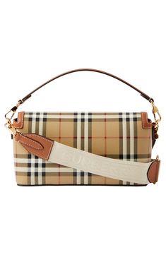 Burberry check patterns this coated-canvas bag trimmed in topstitched leather, accented with gleaming hardware and convertible from crossbody to clutch. Magnetic-snap flap closure Removable top carry handle; removable, adjustable crossbody strap Interior card slot Textile with leather trim Made in Italy Designer Handbags Convertible, Burberry, Check Pattern, Leather Trim, Crossbody Strap, Canvas Bag, Leather Crossbody Bag, Leather Trims, Leather Crossbody