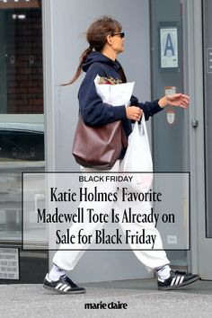 When Katie Holmes wears the same piece several times in a row, we take note. When her favorite, practical, everyday bag goes *on early sale* for Black Friday, we immediately add it to our cart. Click the link to shop the style in every colorway—and find some similar editor picks as well. Madewell Tote, Katie Holmes, Everyday Bag, Madewell, How To Wear