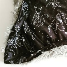 the black and white blanket has stars on it