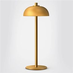 a gold lamp on a white background