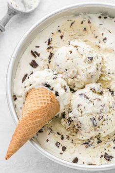 scoops of ice cream in a bowl with chocolate chips