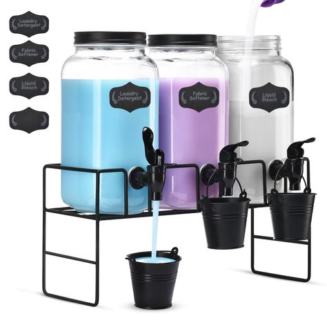 PRICES MAY VARY. [Laundry Detergent Dispenser] Our thoughtfully selected decor package seamlessly blends aesthetics and practicality. The glass laundry detergent dispenser set encompasses everything you need: 3x 2.2L sleek glass jars, 1x sturdy stand, 3x handy cups and 1x labels. These labels make categorizing your jars easy - for "Laundry Detergent," "Fabric Softener," or "Liquid Bleach." We've also provided a blank label for you to personalize! [No More Bulky Containers or Messy Cleanup] Enhan Liquid Laundry Detergent Dispenser, Laundry Detergent Storage, Laundry Soap Dispenser, Laundry Detergent Container, Detergent Storage, Laundry Detergent Dispenser, Laundry Room Organization Storage, Bleach Fabric, Bathroom Towel Decor