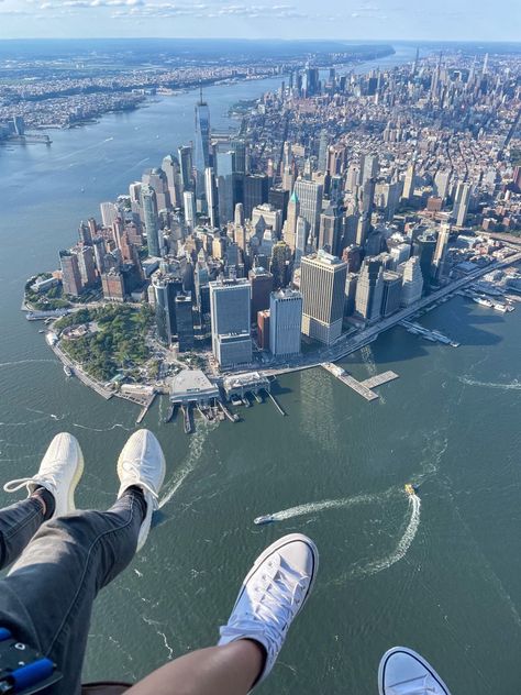 New York City date night. Riding a helicopter with feet dangling out over sky line Helicopter Photography, New York Sightseeing, Nyc Sightseeing, Nyc Attractions, Ny Trip, Constantly Evolving, Helicopter Ride, Nyc Life, New York Life