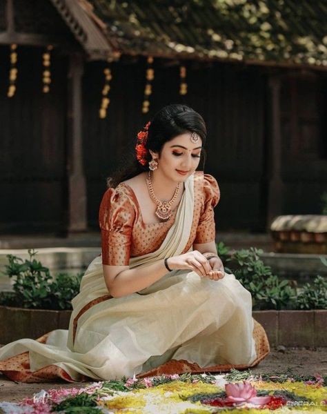 Celebrate this Onam and Vishu with yet stylish looks Look 9 #onam #vishu #keralapiravi #setsaree #traditional #modern #saree #blouse #kerala Onam Saree Blouse, Onam Photoshoot Ideas, Modern Saree Blouse, Onam Look, Set Saree Kerala, Onam Photos, Kerala Traditional Saree, Onam Dress, Kerala Engagement Dress