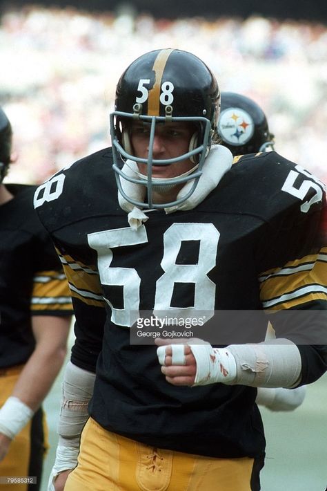 Linebacker Jack Lambert #58 of the Pittsburgh Steelers looks on from the sideline during a game against the Denver Broncos at Three Rivers Stadium on October 12, 1975 in Pittsburgh, Pennsylvania. American Football Rules, Three Rivers Stadium, Pittsburgh Steelers Wallpaper, Jack Lambert, Steelers Country, Pittsburg Steelers, Go Steelers, Football Stars, Nfl Football Players