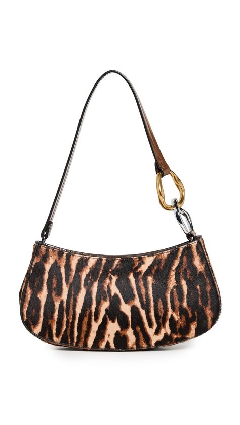 PRICES MAY VARY. Chain accent at handle , Leopard print Length: 9in / 23cm, Height: 4.25in / 11cm, Strap drop: 8.75in / 22cm, Depth: 2in / 5cm Weight: 12oz / 0.34kg Ollie Bag Leopard Print Purse, Leopard Accessories, Camo Stuff, Leopard Purse, Leopard Print Bag, Leopard Clutch, Bday Gifts, Virtual Wardrobe, 2024 Style