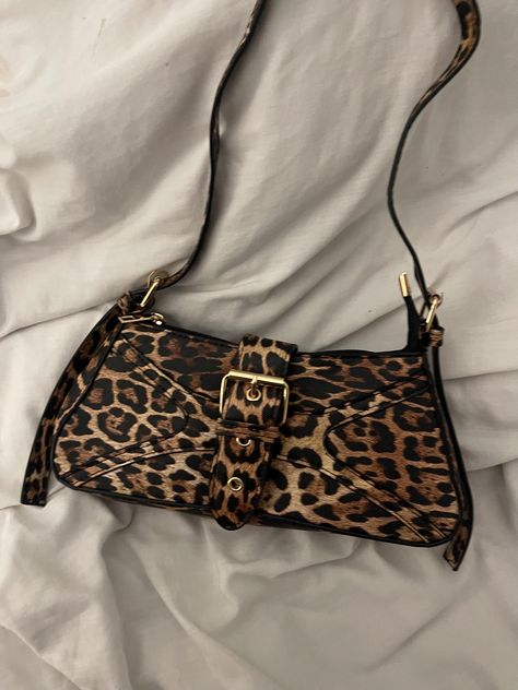 Leopard print leather bag. Super cute and vintage looking  Dimensions Width: 28 cm Length: 12 cm Strap length: 28 cm Coach Leopard Bag, Cheetah Print Purse, Leopard Print Purse, Leopard Print Leather Bag, Coquette Clothes, Printed Leather Bag, Handbag Ideas, Leopard Print Bag, Buckle Bag