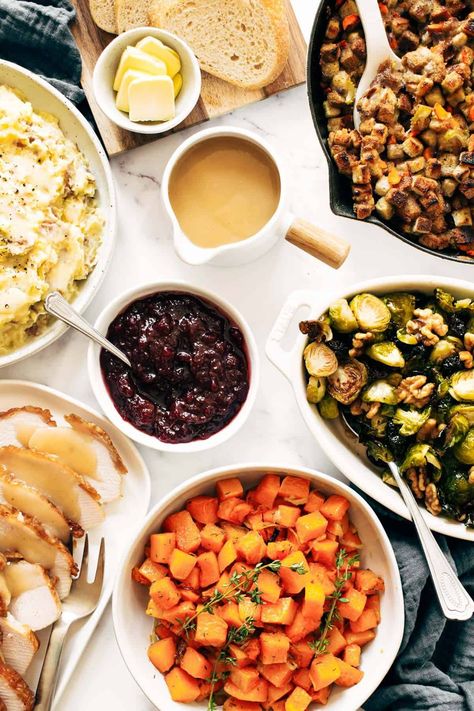 All the Thanksgiving sides you need - made easy in one hour! Roasted garlic mashed potatoes, herbed squash, and maple mustard brussels sprouts. Perfect for a small gathering! #thanksgiving #sides #sheetpan Thanksgiving Dinner For Two, Easy Thanksgiving Dinner, Thanksgiving Vegetables, Roasted Garlic Mashed Potatoes, Herb Turkey, Friendsgiving Food, Thanksgiving Food Sides, Pinch Of Yum, Maple Mustard