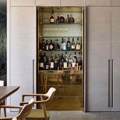 Is it time yet? 🍸😋🍸obsessing over this concealed brass bar from @b.e_architecture Brass In Interior Design, Bar In Niche, Cabinet Around Mini Fridge, Wine Cupboard Kitchen, Hidden Built In Bar, Bar Millwork Design, Bar In Cupboard, Hidden Bar Design, Hidden Drinks Cabinet