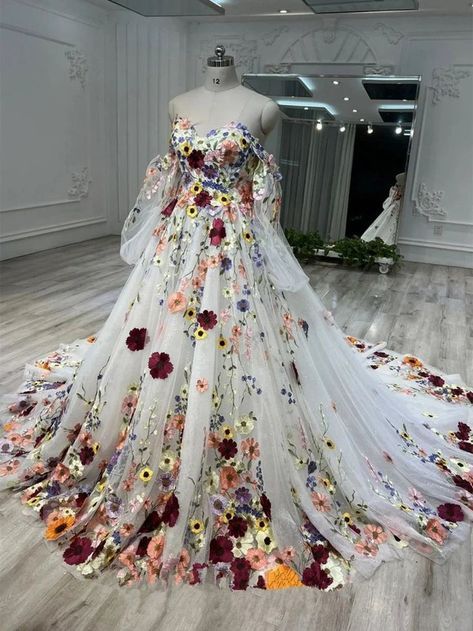 Multi Color Wedding Dress, Dress Covered In Flowers, Wedding Dresses Embroidery Flowers, Colorful Bridal Gown, White Wedding Dress With Colored Flowers, Bright Floral Wedding Dress, Wedding Dress Colorful Flowers, Wedding Dresses With Embroidered Flowers, Colourful Floral Wedding Dress