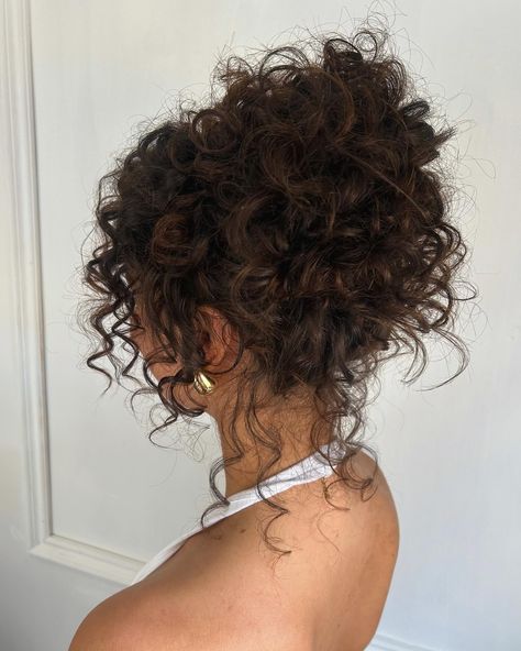 LOVE♥️ doing these naturally curly ups on my clients, @mariastarkeymakeup has came to me for years for her hair extensions so always noticed she had natural curls there👏🏻🥹 so glad we enhanced it for this look Elegant Curly Wedding Hair, Bridesmaid Hair For Off The Shoulder Dress, Hair Inspiration Wedding Guest, Curly Bridal Ponytail, Hair Up Do For Short Hair, Bridal Hair Low Bun Curly, Casual Curly Hairstyles Natural Curls, Long Curly Wedding Hair With Veil, Whimsical Updos Bridal Hairstyles