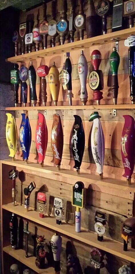 Pallet wall to display my husbands tap handle collection! Tap Handles Beer, Bar Tap Display Ideas, Beer Taps Display Ideas, Beer Tap Ideas, Beer Tap Handle Ideas, Beer Tap Wall, Beer Tap Display, Beer Tap Handle Display, Beer Tap Handles Display