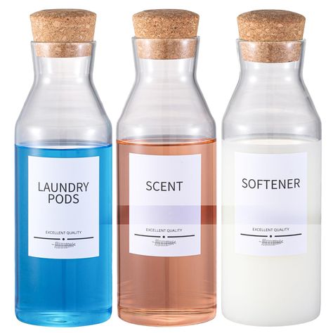 PRICES MAY VARY. 【Customize Your Set】Our Laundry Detergent Dispenser set includes 3pcs glass dispensers and cork lid,the set with 10.2 inches long and 3.5 inches in diameter,and can be filled with 40oz(1200ml). in addition to this also includes 7pcs separate waterproof label stickers for SOFTENER,DETERGENT,BLEACH,DRYER BALLS,LAUNDRY PODS,POWDER,SCENT. 【Style Fashion Contracted】The innovative design of this liquid detergent dispenser seamlessly facilitates the dispensing of detergent into your wa Liquid Detergent Dispenser, Laundry Containers, Non Toxic Laundry Detergent, Liquid Laundry Detergent Dispenser, Laundry Detergent Storage, Laundry Soap Dispenser, Laundry Detergent Container, Detergent Storage, Laundry Beads