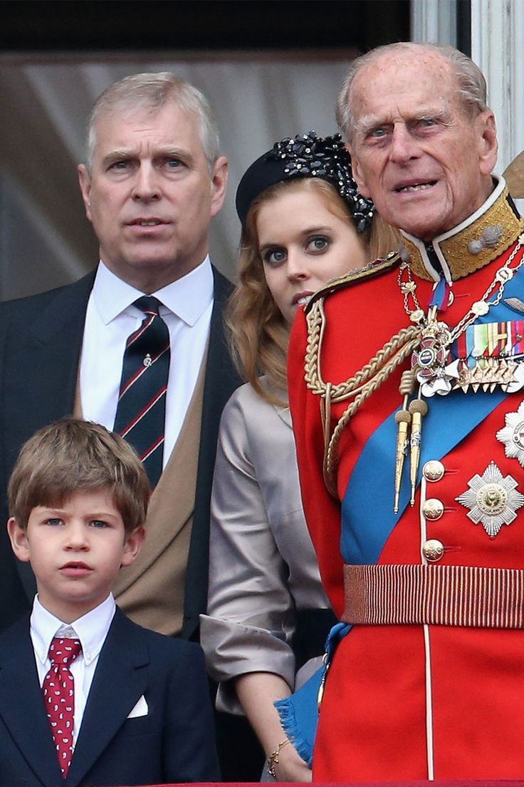 the queen and prince of england with their son, prince charles, at troop's annual parade