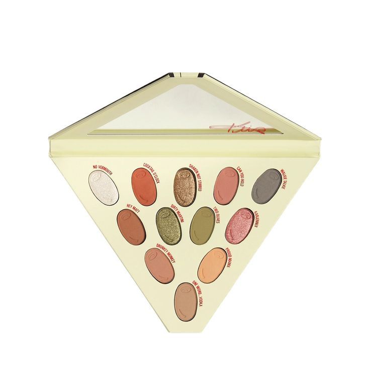 The limited-edition Kris Collection Pressed Powder Palette contains 12 highly pigmented, easy-to-blend shades inspired by Kris' signature smokey eye. This martini designed palette with olive-shaped pans features smooth formulas and warm and cool tones in three finishes: matte, metallic, and shimmer. Kylie Cosmetics Eyeshadow, Powder Palette, Bath Body Works Candles, Design Palette, Cruelty Free Brands, Pigment Coloring, Dirty Martini, Vermouth, Matte Metallic