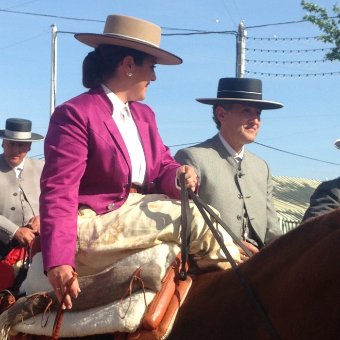 These amazon jackets are usually in sombre grey, blue or black. A flash of fuscia livens up the horsey set.