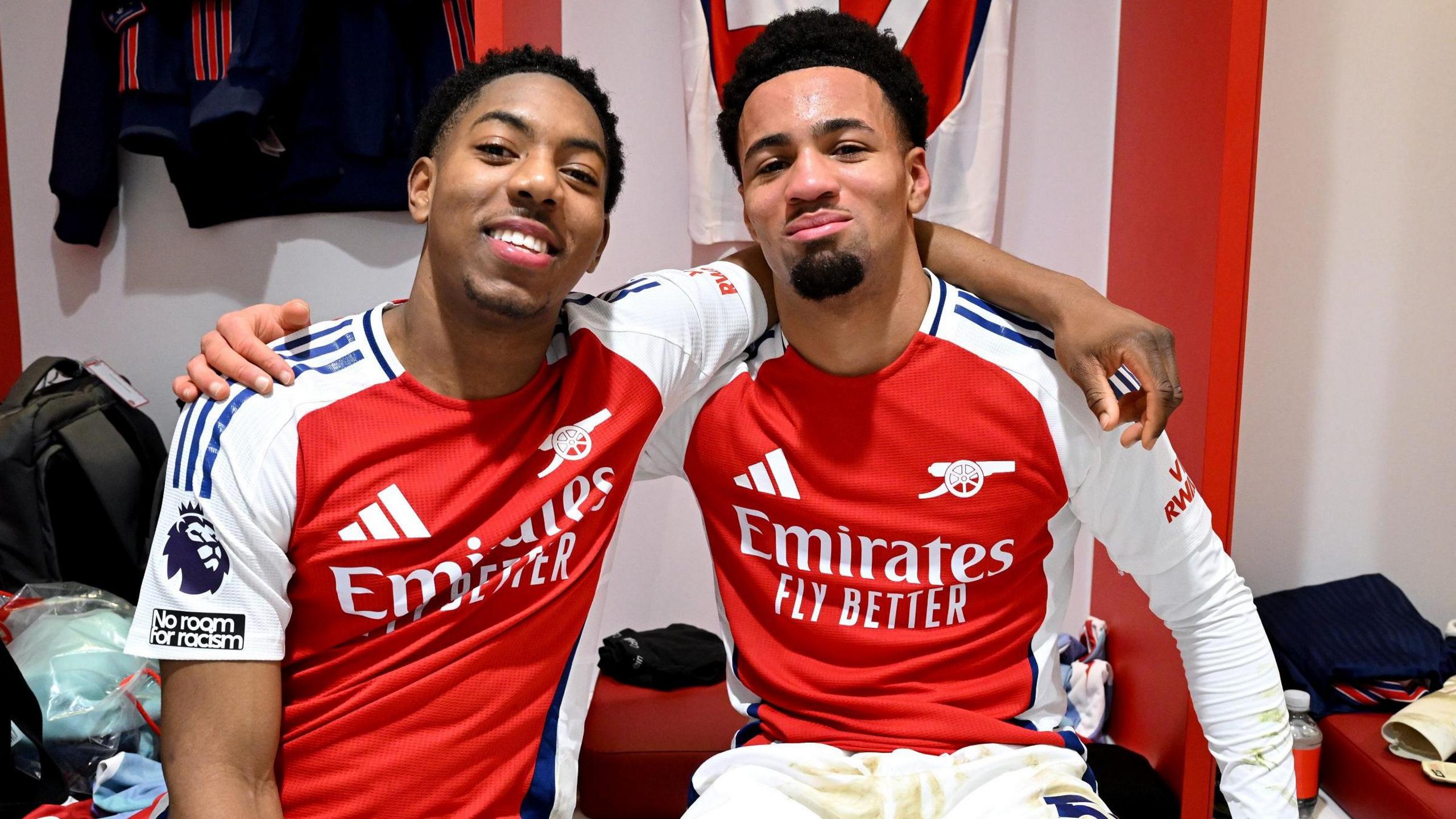 Arsenal's teenage duo Myles Lewis-Skelly and Ethan Nwaneri celebrate in the dressing room after scoring in the 5-1 thrashing of Manchester City