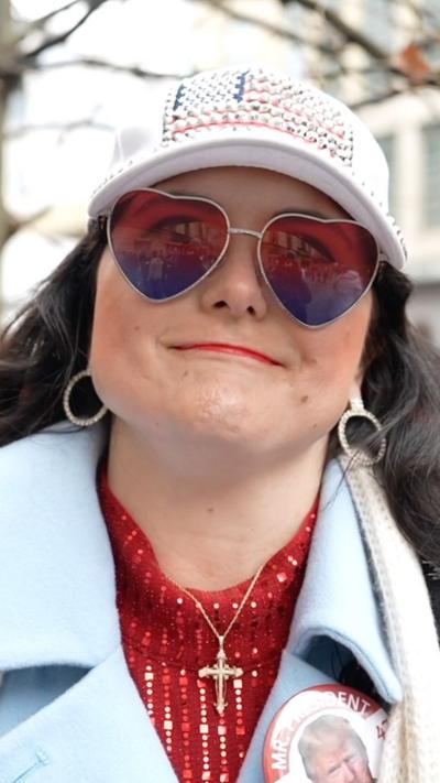 One of Trump's supporters, wearing heart sunglasses.