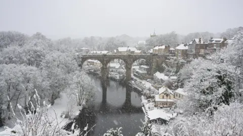 A snowy scene of Knaresborough viaduct