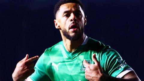 Andre Gray celebrates scoring Plymouth Argyle's equaliser against Watford