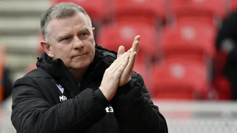 New Stoke City boss Mark Robins was taking charge of his first game following the Christmas sacking of Narcis Pelach