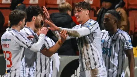 Dunfermline Athletic players celebrating