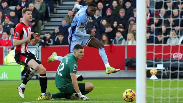 Pape Matar Sarr of Tottenham Hotspur scores