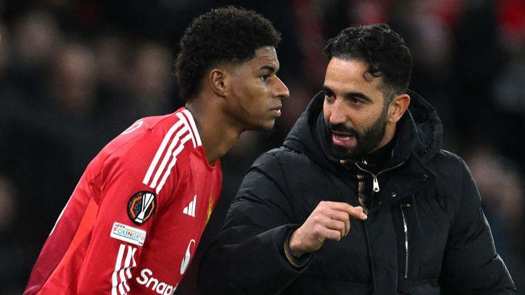 Ruben Amorim gives instructions to Marcus Rashford before a substitute appearance in the Europa League