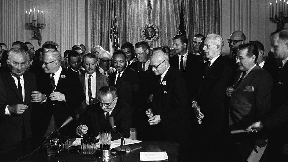 Lyndon Baines Johnson, referred to as LBJ, served as the 36th President of the United States from (1963-1969). Lyndon Johnson signing the Civil Rights Act, 2 July 1964. Martin Luther King looks on.