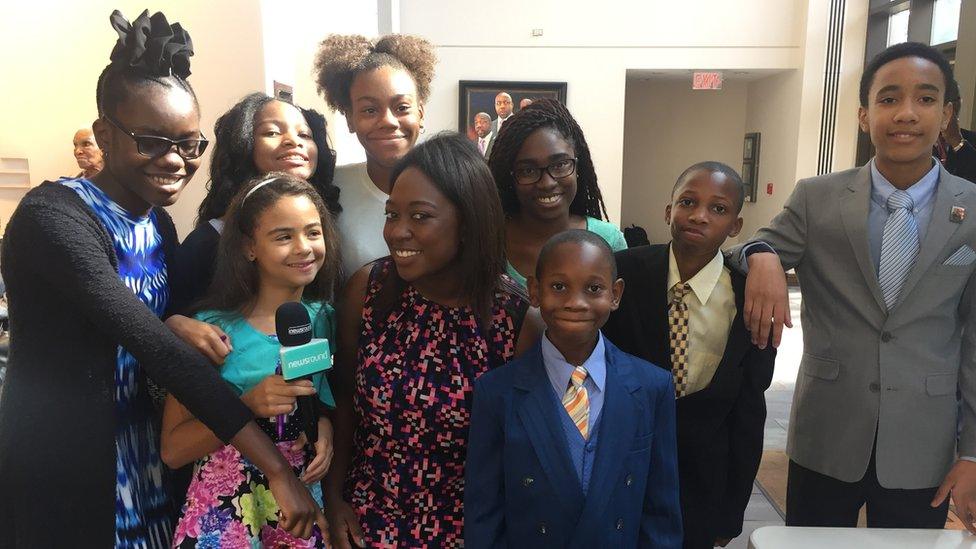 Ayshah with kids at Ebenezer Baptist church service