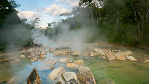 The Boiling River, with steam rising from its surface (Credit: Riley Fortier)