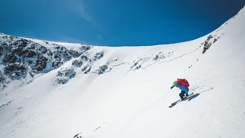 Man skiing down steep terrain in Tuckerman Ravine, New Hampshire (Credit: Alamy)