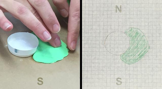 Photo of someone drawing the shape of the lava flow on a piece of graph paper