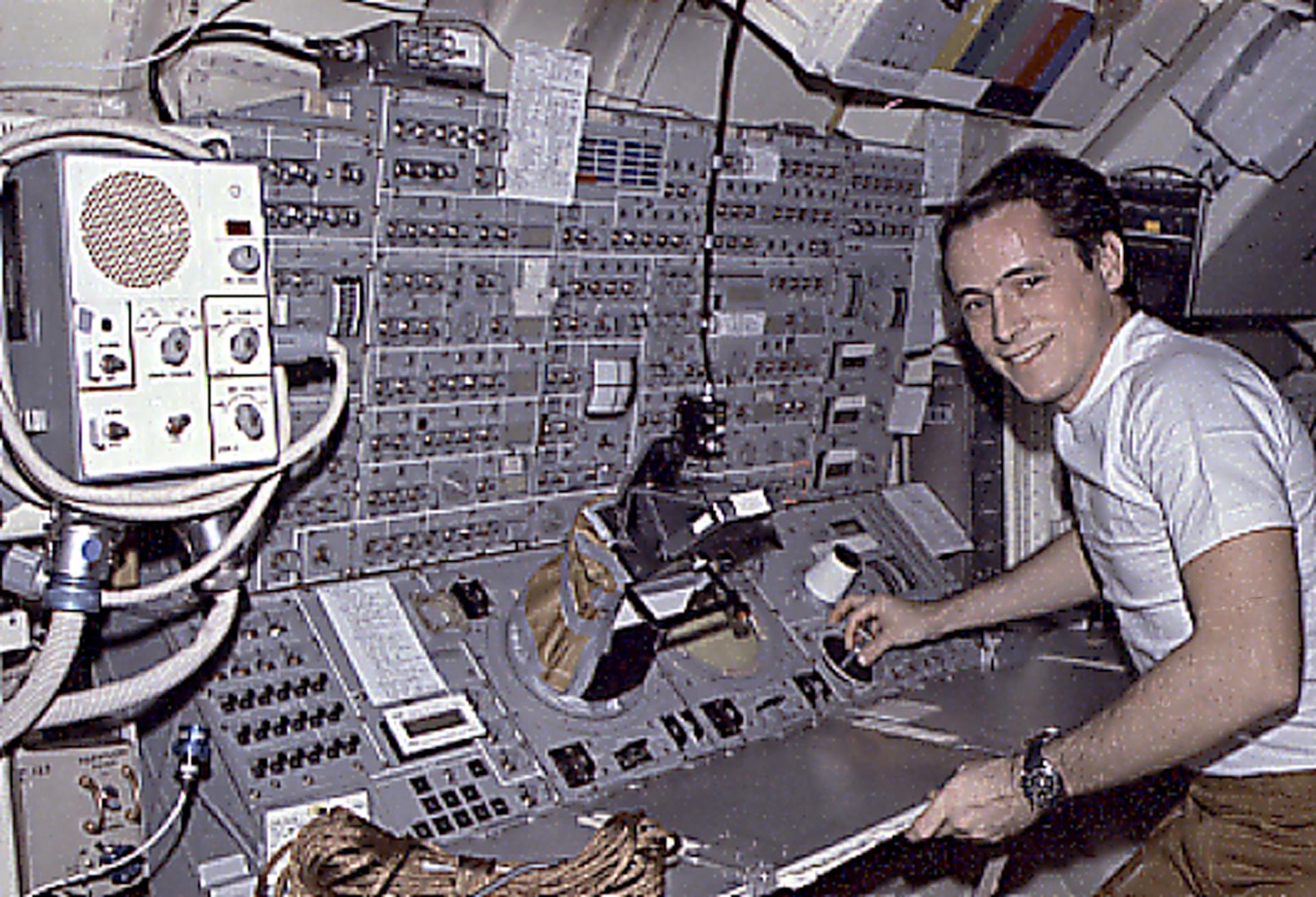 Ed Gibson at a Skylab control panel