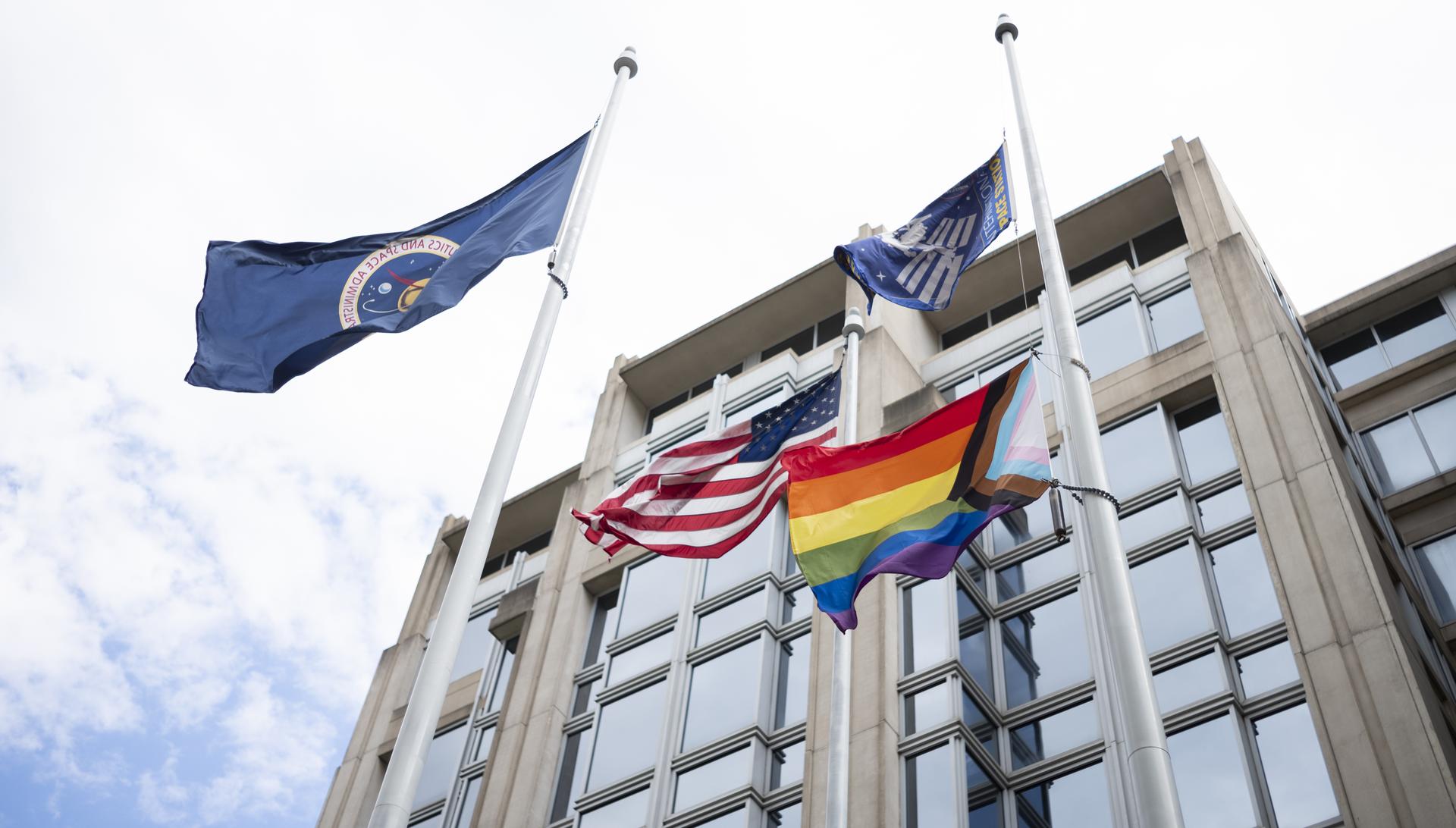 The Progress Pride flag is seen flying at the Mary W. Jackson NASA Headquarters