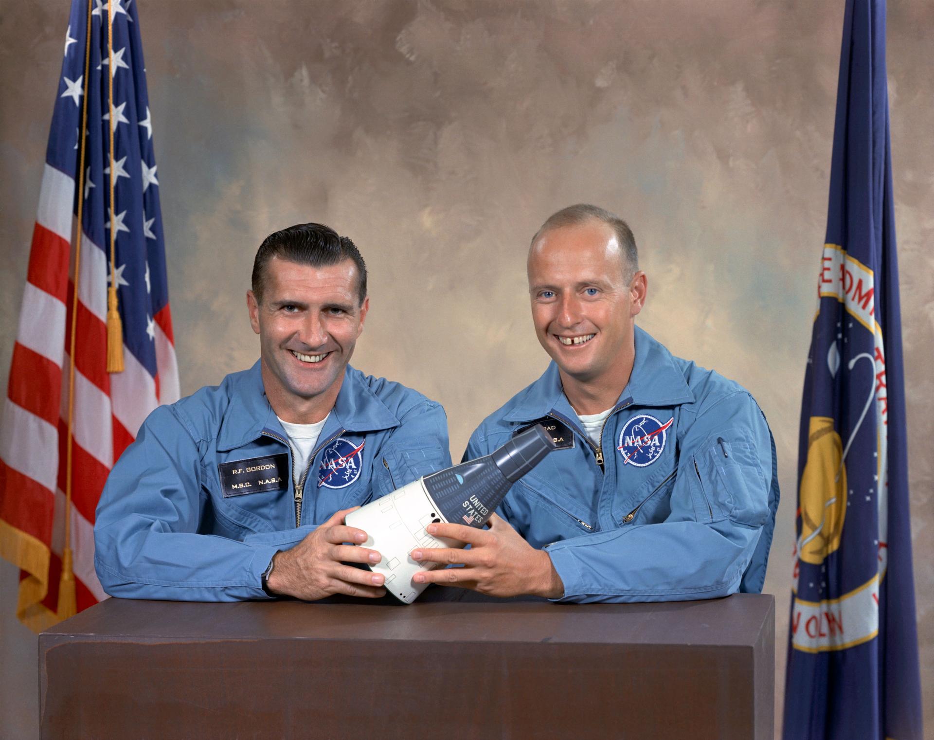 Gemini XI pilot Dick Gordon and commander Pete Conrad performed a docking maneuver with the Agena target vehicle similar to what the Apollo Command Module and Lunar Module would later be required to do during the Apollo missions.