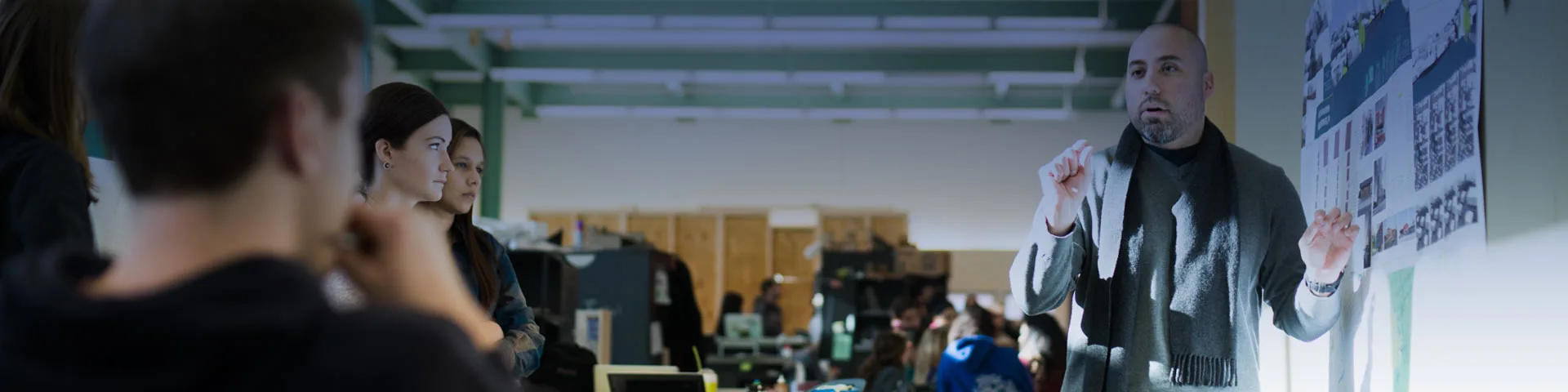 Faculty member teaching students in a classroom