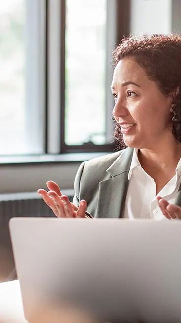 Stock photo of woman leading a meeting