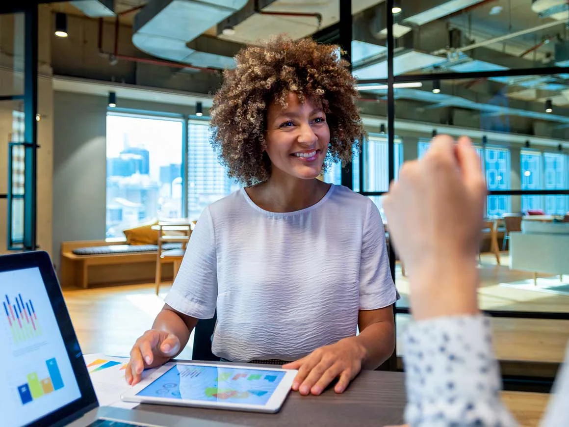 Female discussing data with a colleague